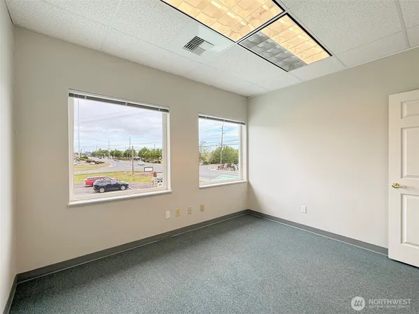 an empty room with windows