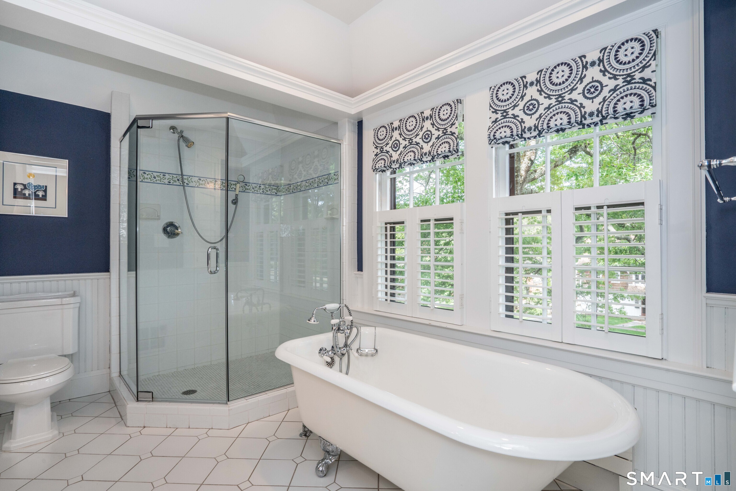 7 Fernwood Road West Hartford, CT 06119 - Photo 21 of 40 a white bath tub sitting next to a toilet
