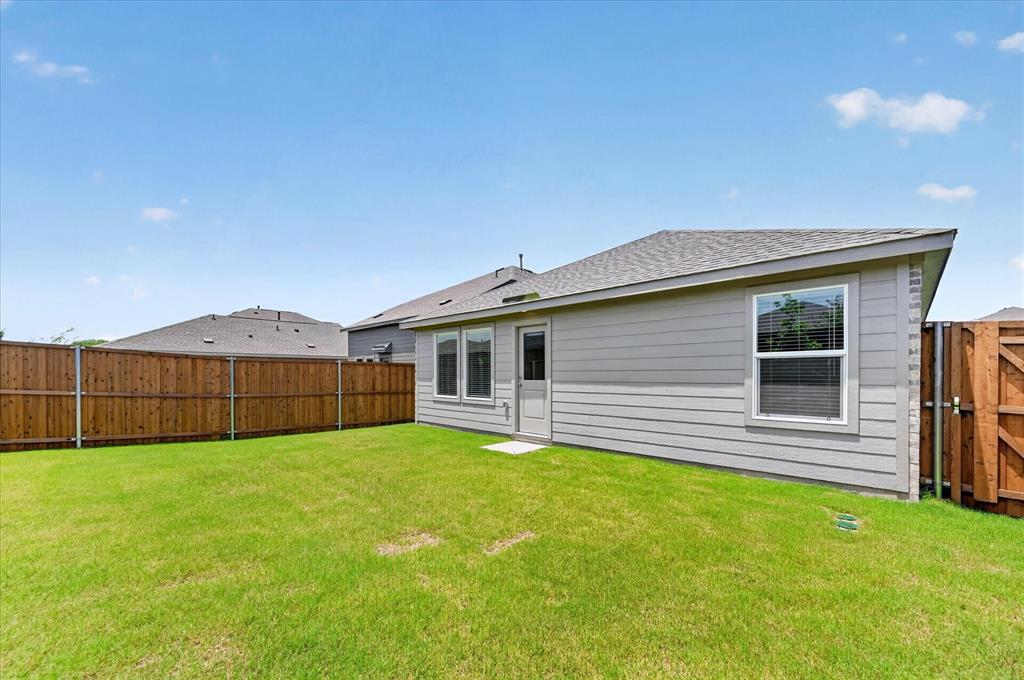 1516 Prince Road Howe, TX 75459 - Photo 27 of 28 a view of a house with a yard and a large tree