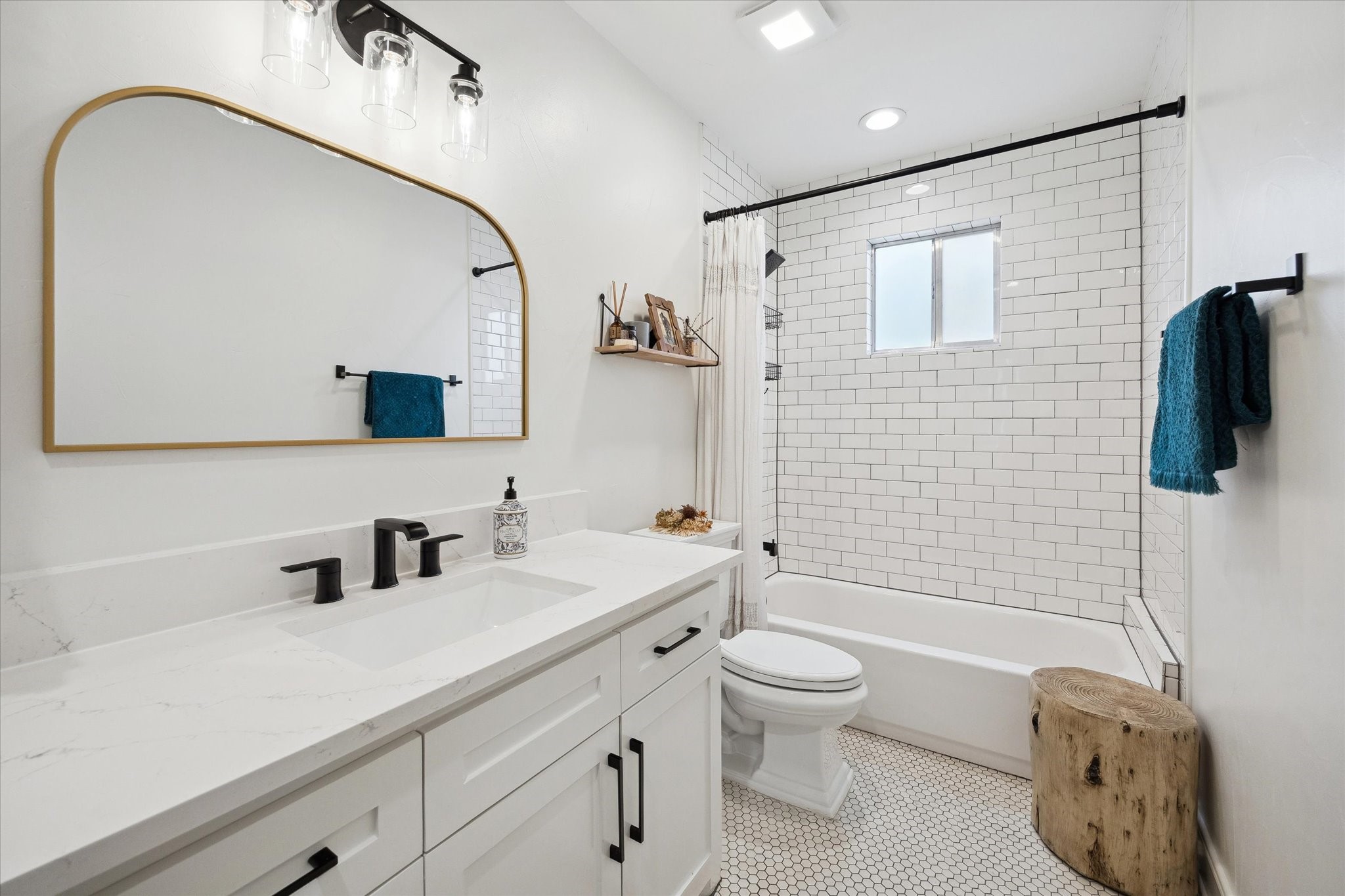 838 East 24th Street Houston, TX 77009 - Photo 13 of 28 a bathroom with a sink a toilet and shower