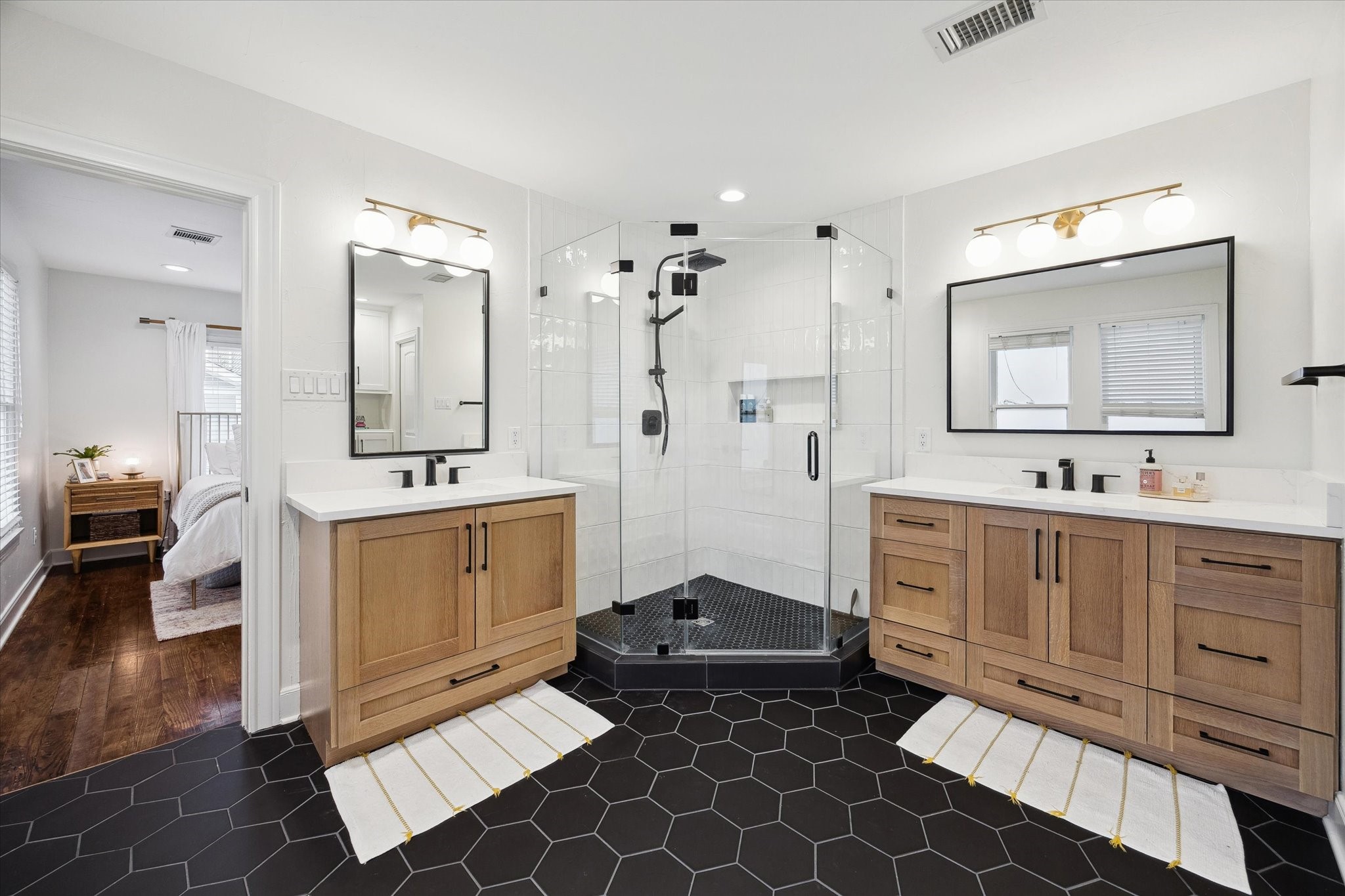 838 East 24th Street Houston, TX 77009 - Photo 16 of 28 a spacious bathroom with a double vanity sink mirror and