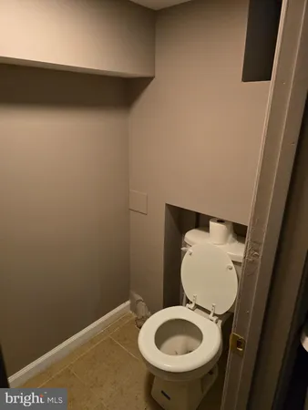 a close view of a sink and a washer and dryer