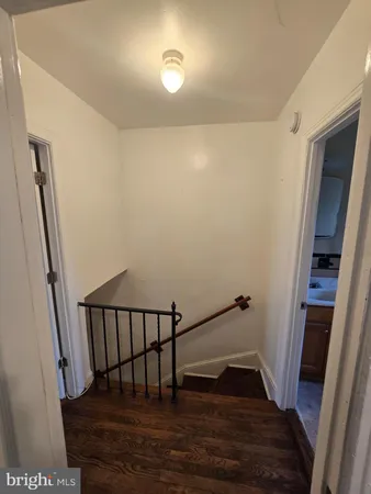 a view of entryway with wooden floor