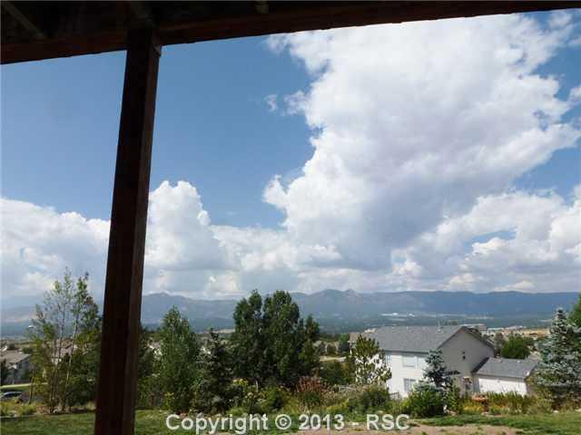 12172 Stanley Canyon Road Colorado Springs, CO 80921 - Photo 18 of 25 Views from lower level patio walk-out