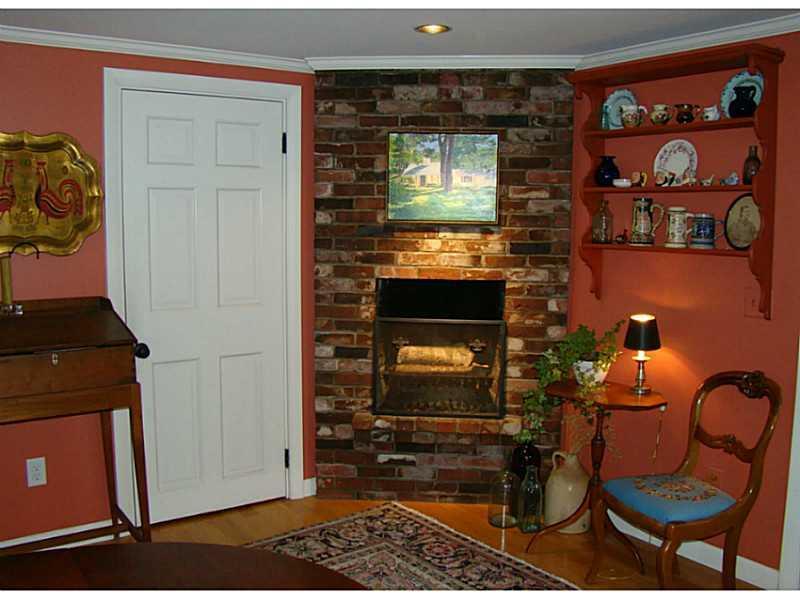 76 Nottingham Road Auburn, ME 04210 - Photo 8 of 35 Dining Room. View #3 showing fireplace.