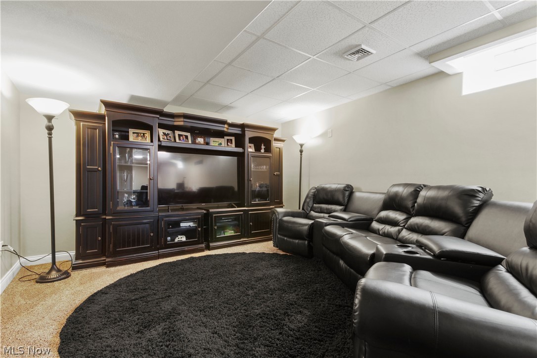 1805 East Western Reserve Road Youngstown, OH 44514 - Photo 2 of 31 Carpeted home theater with a paneled ceiling