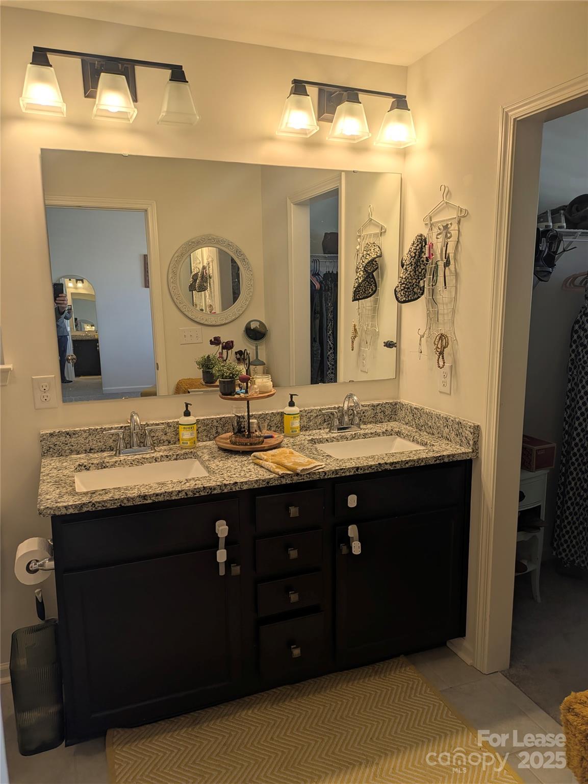 7481 Hartsfield Drive Lancaster, SC 29720 - Photo 17 of 27 a bathroom with a granite countertop double vanity sink and a mirror