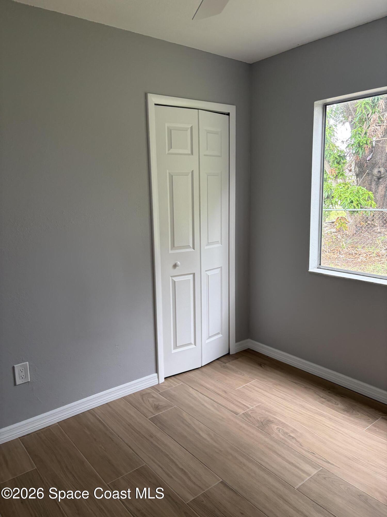 1136 Minnet Court Northeast Palm Bay, FL 32905 - Photo 29 of 31 Middle Bedroom 2