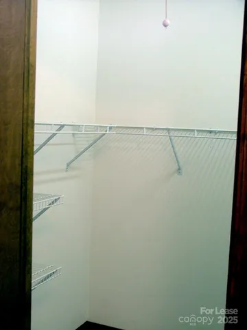 a view of small space with wooden floor