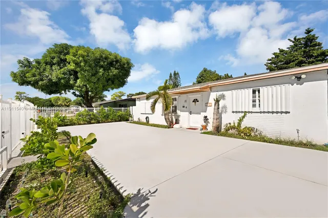 a street view with garden space