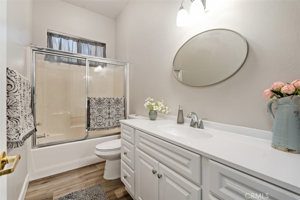 68262 Pasada Road Cathedral City, CA 92234 - Photo 13 of 27 a bathroom with a sink a toilet and shower