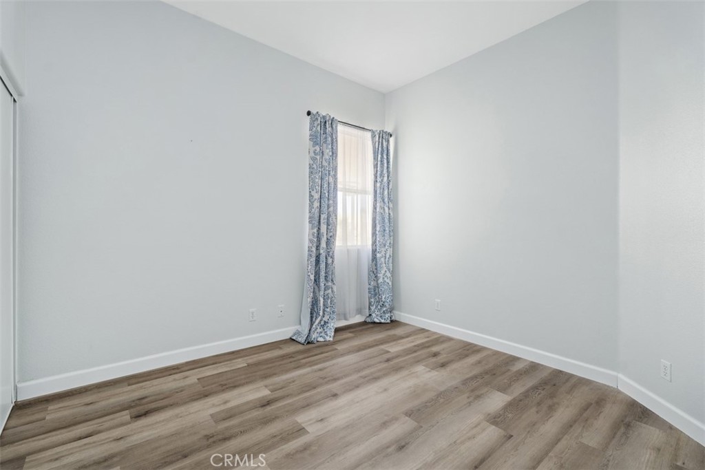 68262 Pasada Road Cathedral City, CA 92234 - Photo 15 of 27 a view of empty room with wooden floor