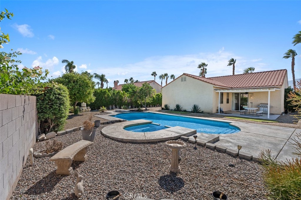 68262 Pasada Road Cathedral City, CA 92234 - Photo 22 of 27 a front view of a house with garden