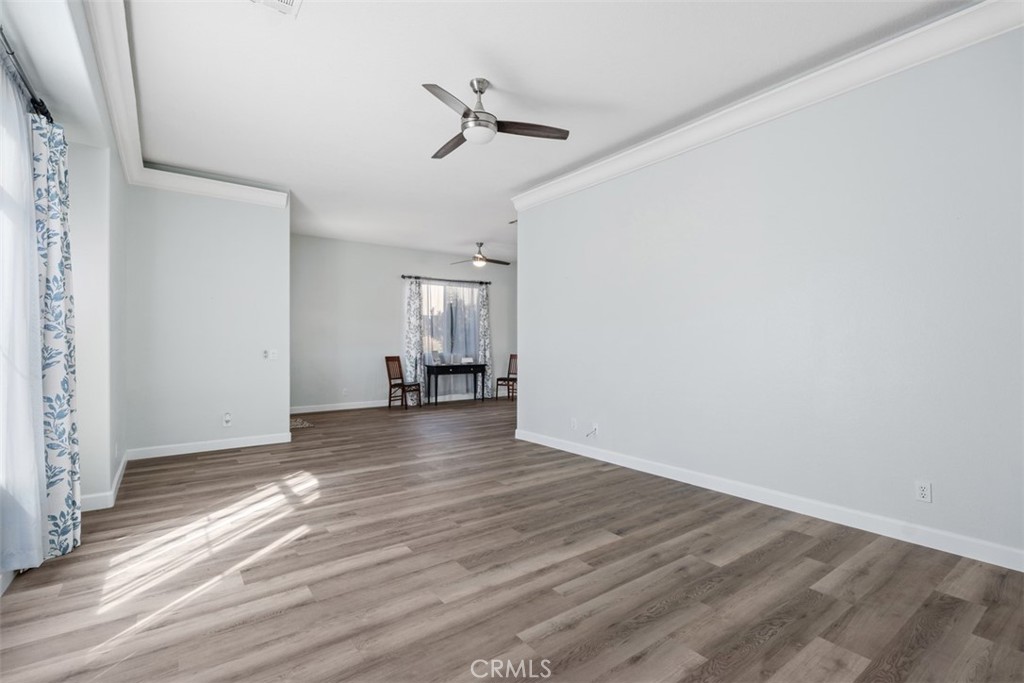 68262 Pasada Road Cathedral City, CA 92234 - Photo 6 of 27 wooden floor in an empty room