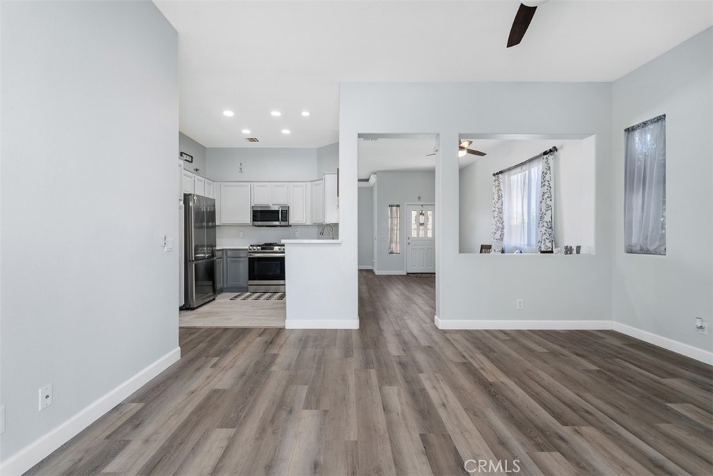 68262 Pasada Road Cathedral City, CA 92234 - Photo 9 of 27 a view of a kitchen with wooden floor and a kitchen