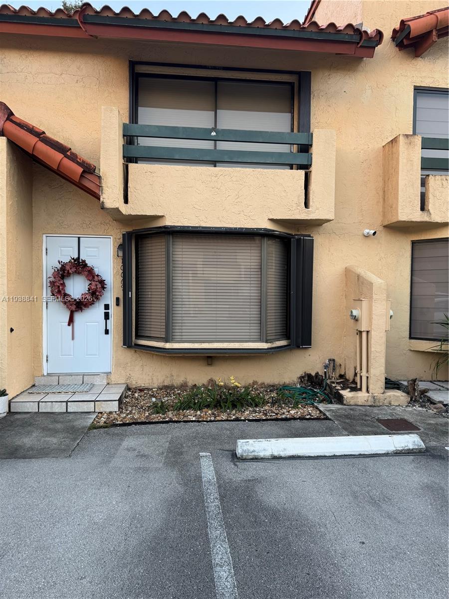 10069 Southwest 77th Court Miami, FL 33156 - Photo 15 of 16 a front view of a house