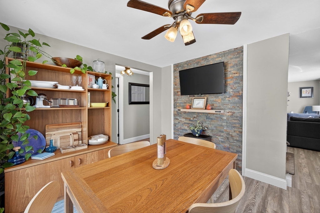181 Head Of The Bay Road Bourne, MA 02532 - Photo 13 of 34 a room with furniture and flat screen tv