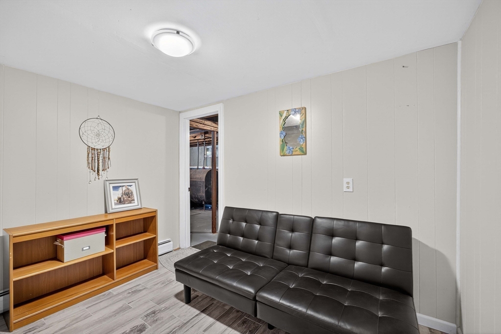 181 Head Of The Bay Road Bourne, MA 02532 - Photo 19 of 34 a living room with furniture
