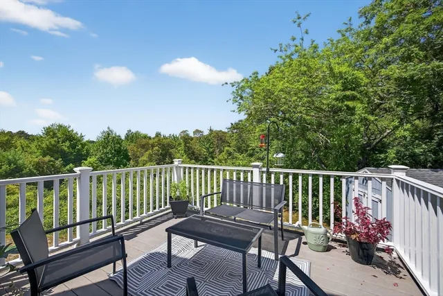 a view of a two chairs in the roof deck