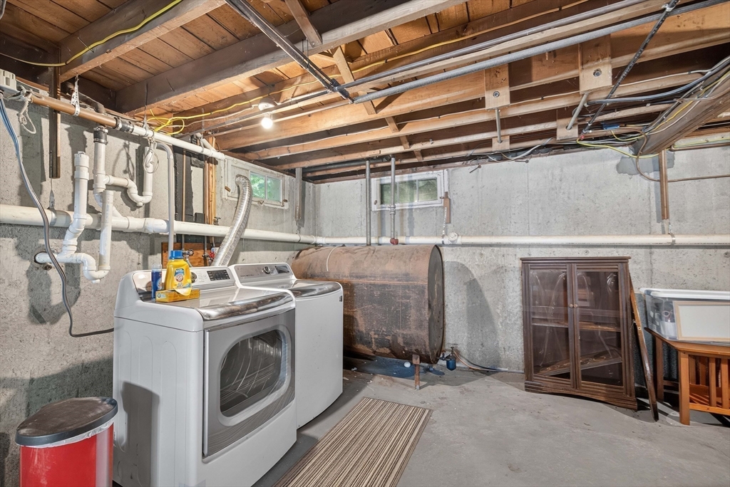 181 Head Of The Bay Road Bourne, MA 02532 - Photo 27 of 34 a utility room with dryer and washer