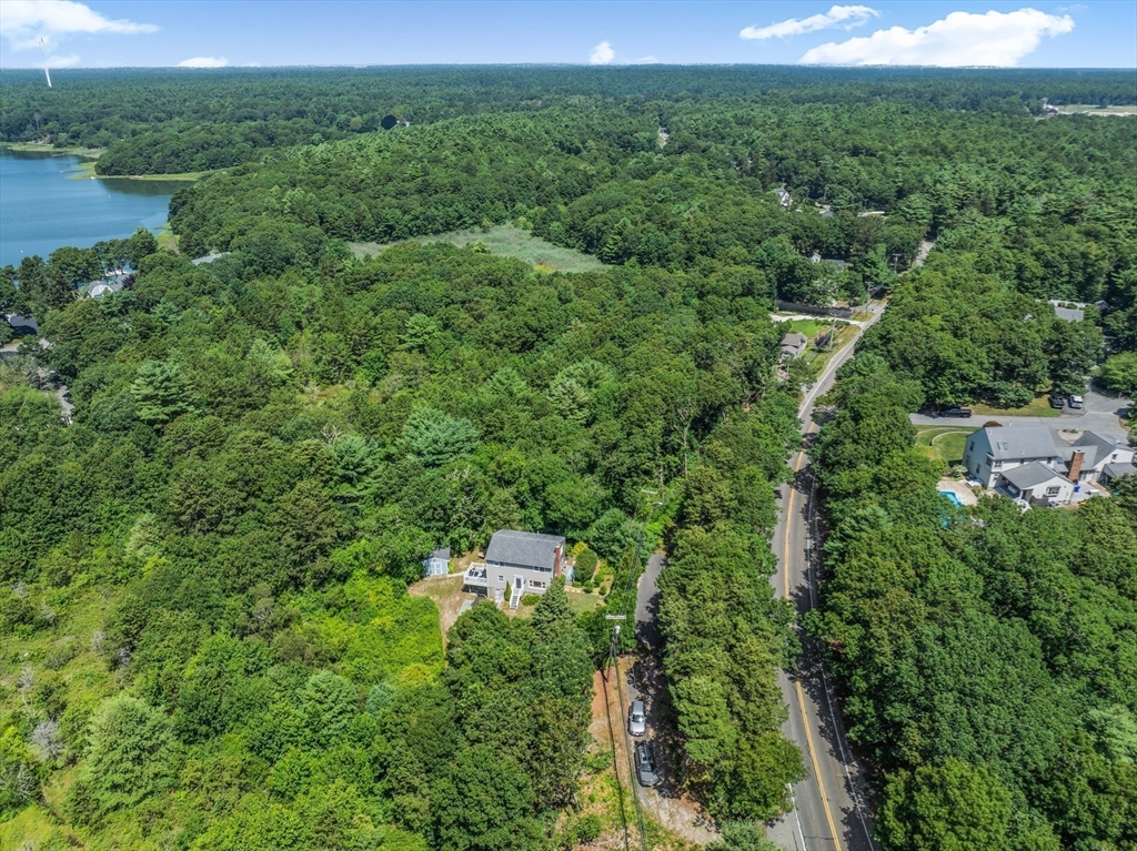 181 Head Of The Bay Road Bourne, MA 02532 - Photo 29 of 34 an aerial view of a house with outdoor space and street view