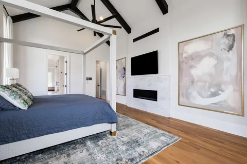 a bathroom with a shower and a sink