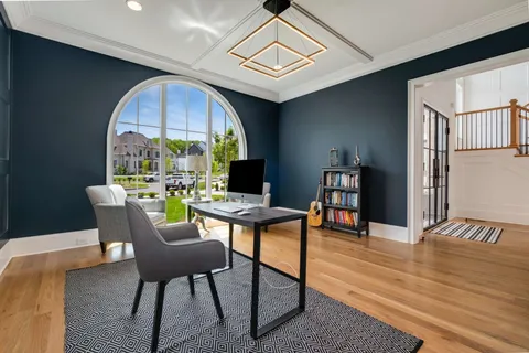 a bathroom with a double vanity sink mirror and shower