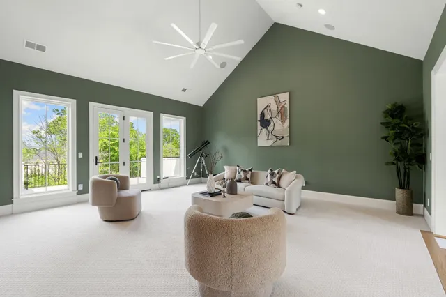 a work room with furniture and windows