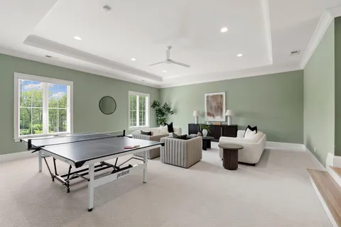 a spacious bedroom with a bed and a couch