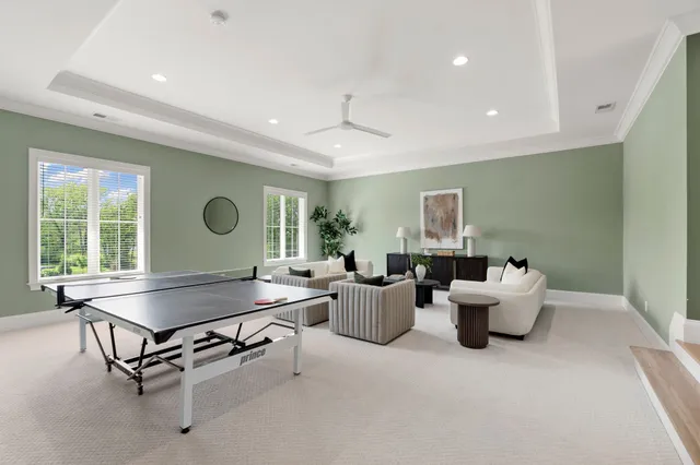 a spacious bedroom with a bed and a couch