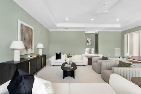 a white bath tub sitting in a bathroom