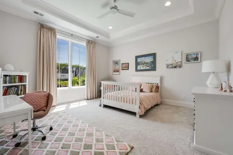 a living room with fireplace furniture and a flat screen tv