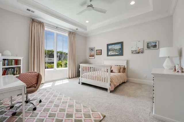 a living room with fireplace furniture and a flat screen tv