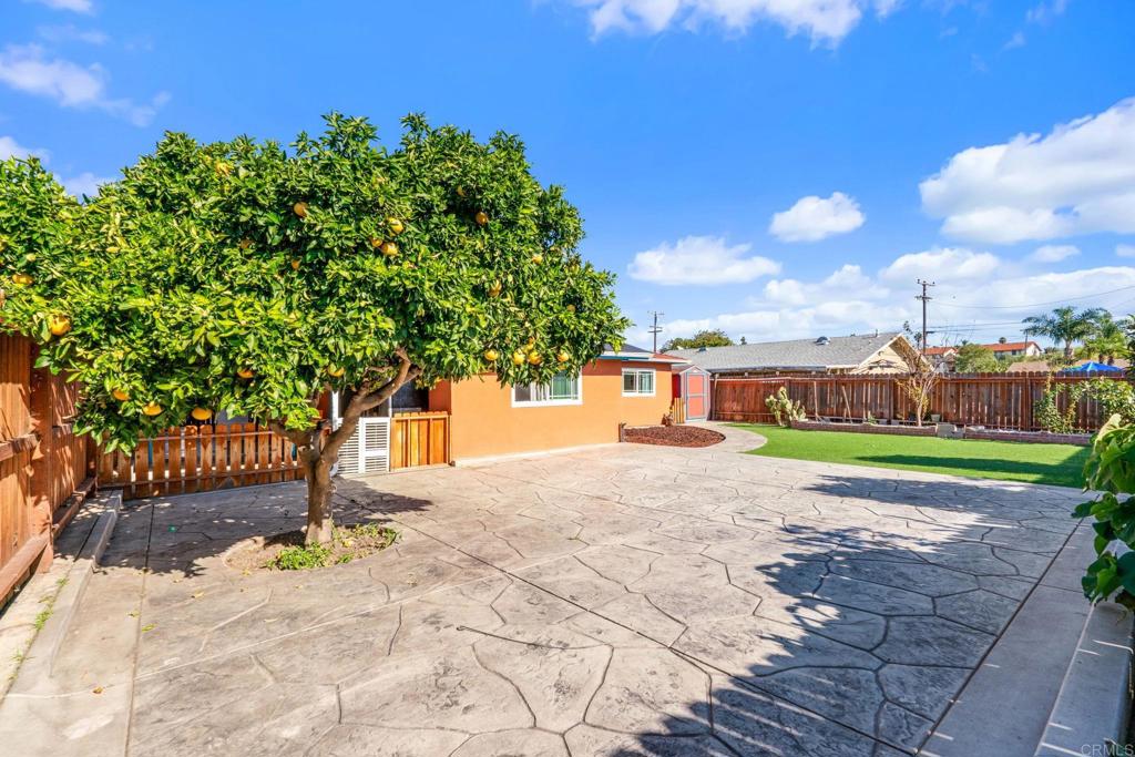 512 Tatum Street Vista, CA 92083 - Photo 18 of 26 a house with trees in the background
