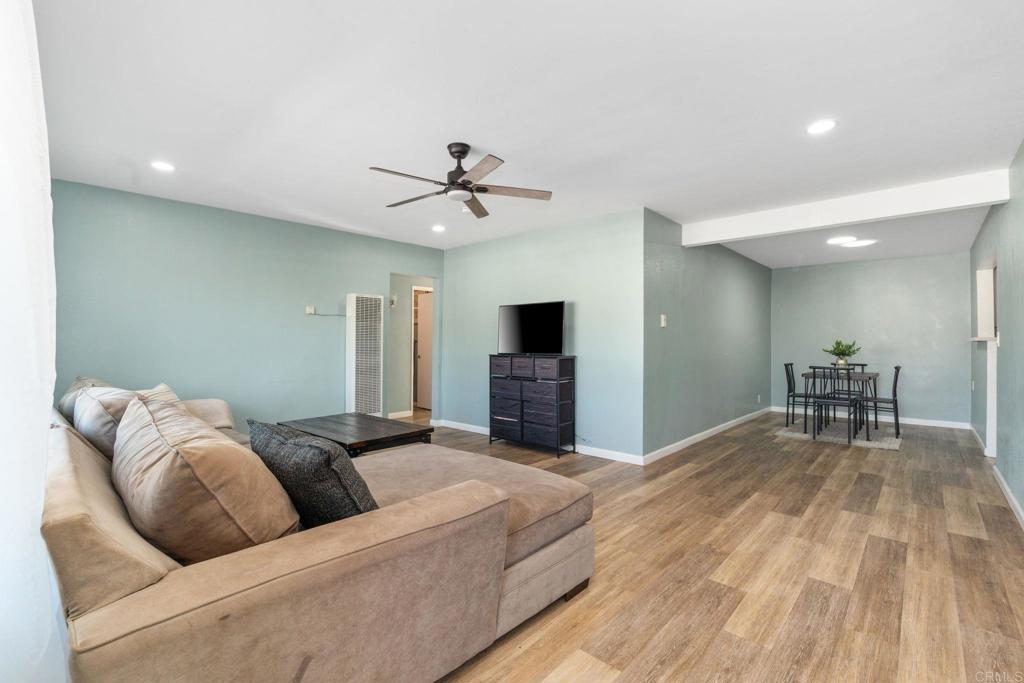 512 Tatum Street Vista, CA 92083 - Photo 5 of 26 a living room with furniture and a flat screen tv