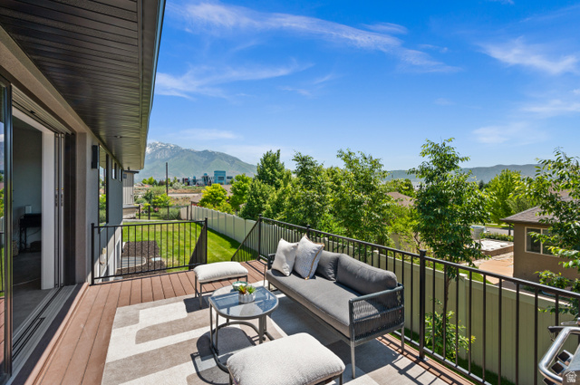 507 West Windmill Gate Cove Draper, UT 84020 - Photo 11 of 46 Balcony featuring a mountain view and an outdoor hangout area