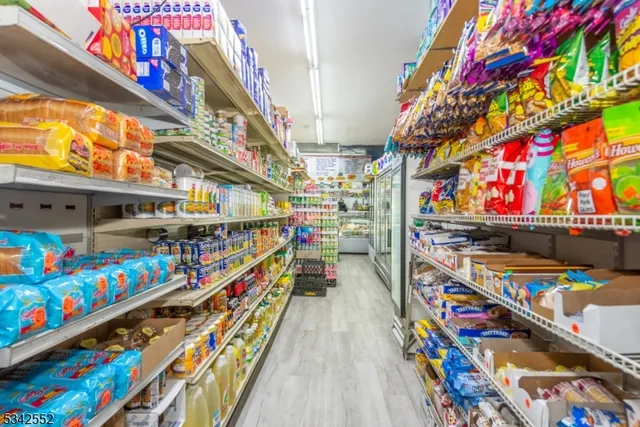 a kitchen with a stove microwave and refrigerator