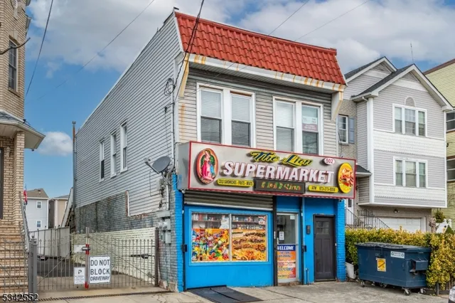 a cafe on the corner of a building