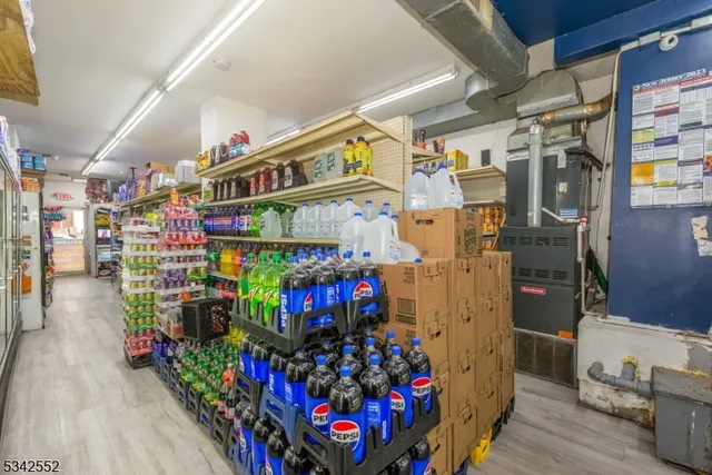 a store filled with lots of fruit and vegetables