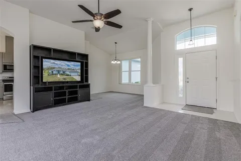 a view of a livingroom with a flat screen tv