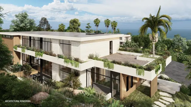 an aerial view of a house with outdoor space