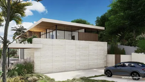a car parked in front of a white house with large trees