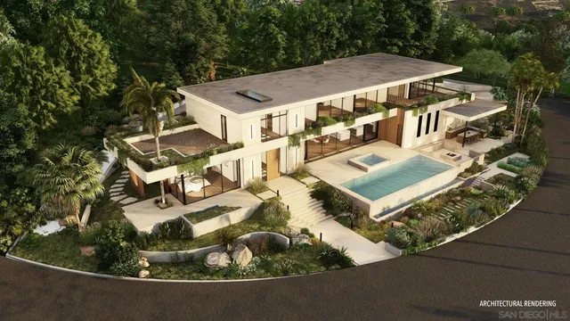 an aerial view of a house with yard