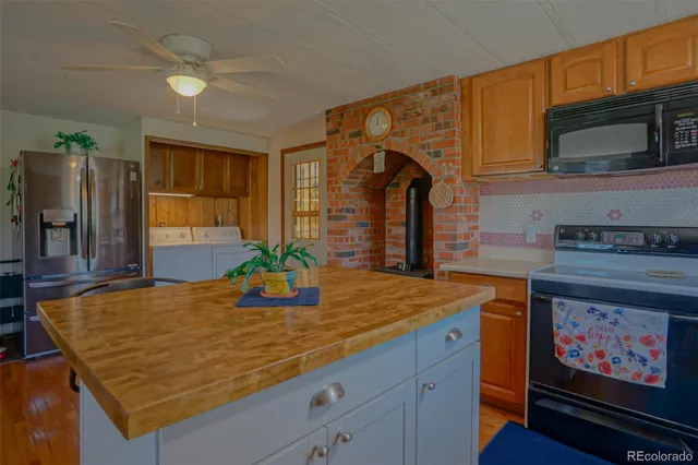 a room with pool table and flat screen tv