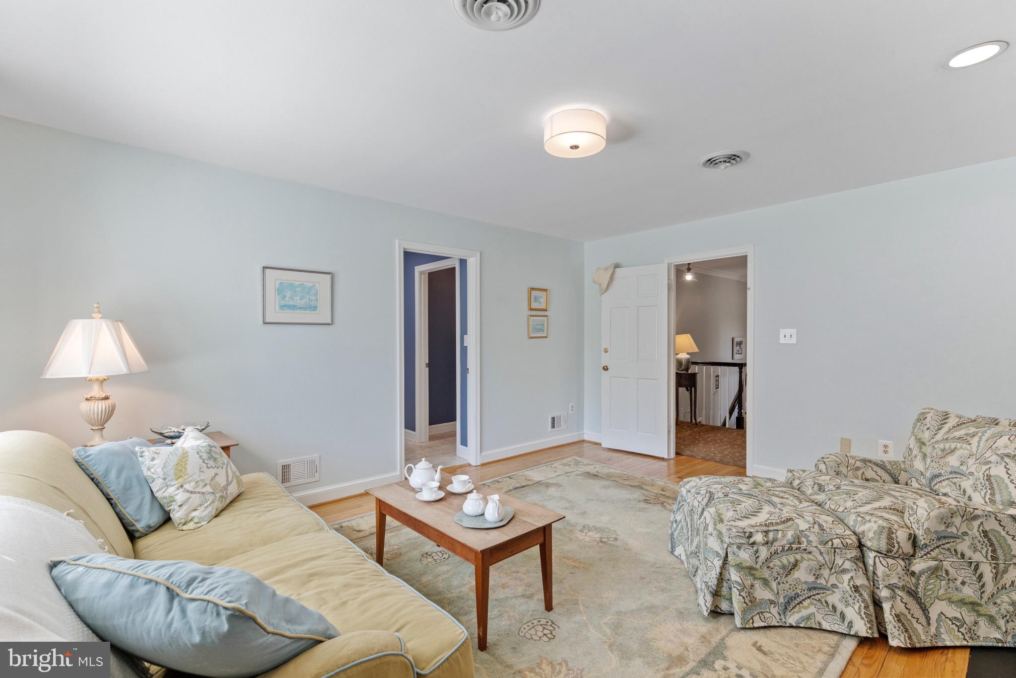 13613 Query Mill Road North Potomac, MD 20878 - Photo 36 of 87 Owners' Suite Sitting Room w/ Fireplace
