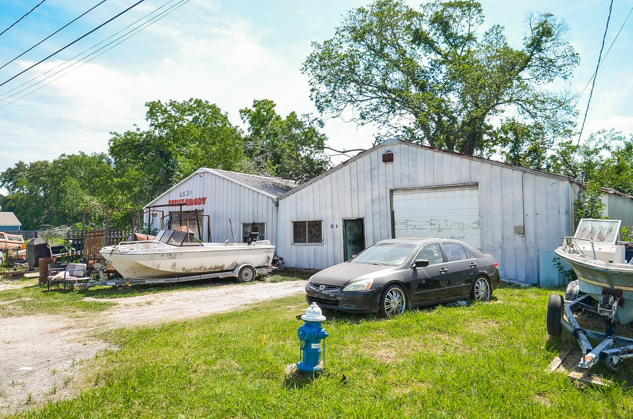 6531 New York Street Houston, TX 77021 - Photo 7 of 10 a front view of a house with cars parked