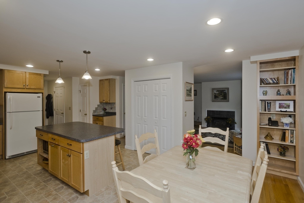 11 Sheerman Lane Amherst, MA 01002 - Photo 8 of 37 a kitchen with stainless steel appliances granite countertop a sink and a refrigerator
