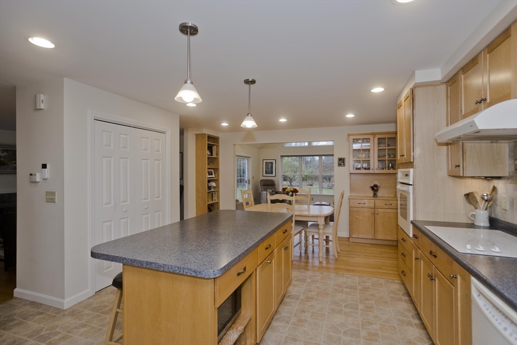 11 Sheerman Lane Amherst, MA 01002 - Photo 10 of 37 a kitchen with stainless steel appliances granite countertop a sink a refrigerator and a stove