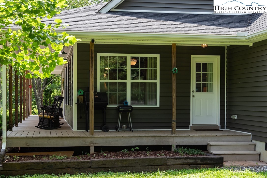 351 Colony Lane Purlear, NC 28665 - Photo 13 of 39 a front view of a house with porch