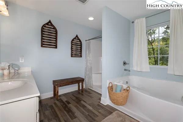 a bathroom with a sink and a bathtub